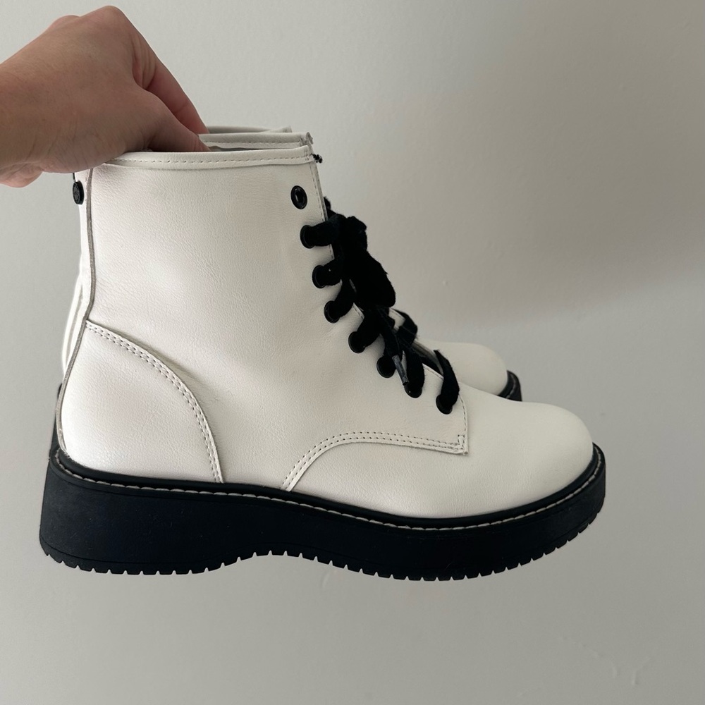 Stylish White Ankle Boots with Black Accents